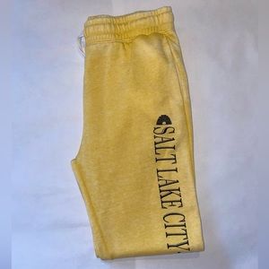 Brand new sweatpants…could return because they were purchased on vacation.